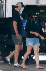 TIFFANI THIESSEN in Denim Shorts at a Car Wash in Los Angeles 08/12/2020