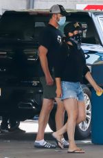 TIFFANI THIESSEN in Denim Shorts at a Car Wash in Los Angeles 08/12/2020