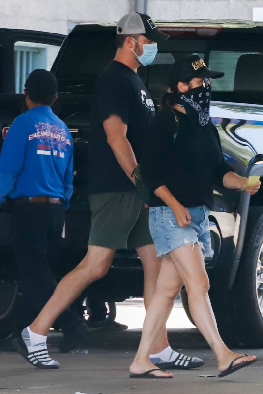 TIFFANI THIESSEN in Denim Shorts at a Car Wash in Los Angeles 08/12/2020