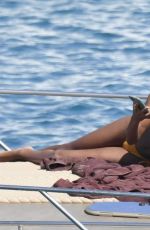 TINA KUNAKEY in Bikinis on Holiday in Greece 08/06/2020