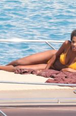 TINA KUNAKEY in Bikinis on Holiday in Greece 08/06/2020