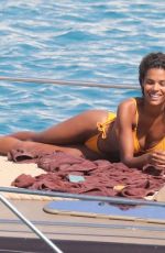 TINA KUNAKEY in Bikinis on Holiday in Greece 08/06/2020