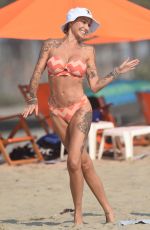 TINA LOUISE in a Orange Bikini at a Beach in Santa Monica 08/22/2020