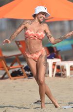 TINA LOUISE in a Orange Bikini at a Beach in Santa Monica 08/22/2020