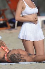 TINA LOUISE in a Orange Bikini at a Beach in Santa Monica 08/22/2020