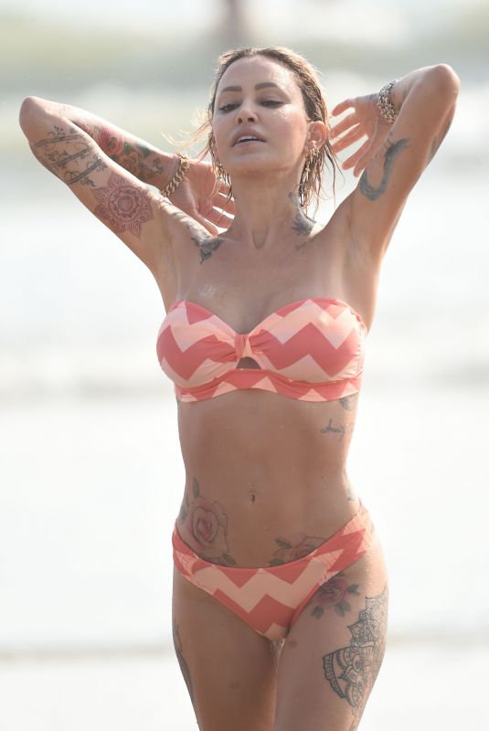 TINA LOUISE in a Orange Bikini at a Beach in Santa Monica 08/22/2020