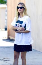 ASHLEY BENSON Out with Her Dog in Los Angeles 09/29/2020