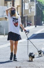 ASHLEY BENSON Out with Her Dog in Los Angeles 09/29/2020