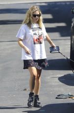 ASHLEY BENSON Out with Her Dog in Los Angeles 09/29/2020