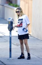 ASHLEY BENSON Out with Her Dog in Los Angeles 09/29/2020
