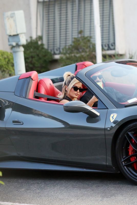 BEBE REXHA Gets a New Ferrari Delivered to Her Home in Los Angeles 09/17/2020