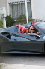 BEBE REXHA Gets a New Ferrari Delivered to Her Home in Los Angeles 09/17/2020