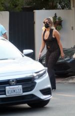 BEBE REXHA Gets a New Ferrari Delivered to Her Home in Los Angeles 09/17/2020