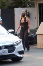 BEBE REXHA Gets a New Ferrari Delivered to Her Home in Los Angeles 09/17/2020