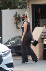 BEBE REXHA Gets a New Ferrari Delivered to Her Home in Los Angeles 09/17/2020