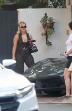 BEBE REXHA Gets a New Ferrari Delivered to Her Home in Los Angeles 09/17/2020