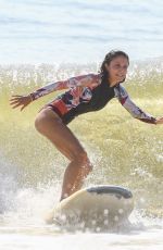 BETHENNY FRANKEL in Swimsuit Surfing at a beach in The Hamptons 09/08/2020