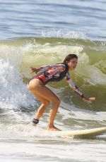 BETHENNY FRANKEL in Swimsuit Surfing at a beach in The Hamptons 09/08/2020