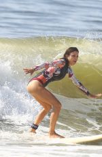 BETHENNY FRANKEL in Swimsuit Surfing at a beach in The Hamptons 09/08/2020