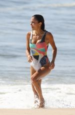 BETHENNY FRANKEL in Swimsuit Surfing at a beach in The Hamptons 09/08/2020