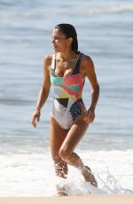BETHENNY FRANKEL in Swimsuit Surfing at a beach in The Hamptons 09/08/2020
