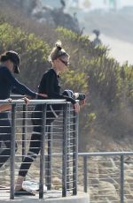 CHARLOTTE MCKINNEY Doing Yoga with Friends at a Beach in Malibu 09/23/2020