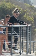 CHARLOTTE MCKINNEY Doing Yoga with Friends at a Beach in Malibu 09/23/2020