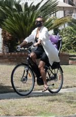 CHRISSY TEIGEN Out Riding a Bike in Sherman Oaks 09/03/2020
