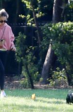 EMILIA CLARKE Out with Her Dog at a Park in London 09/14/2020