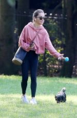 EMILIA CLARKE Out with Her Dog at a Park in London 09/14/2020