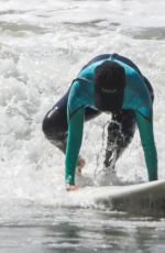 KOURTNEY KARDASHIAN in Wetsuit at Surf Lesson in Malibu 09/27/2020