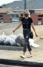 MALIN AKERMAN in Ripped Denim and Year of the Woman T-shirt Out in Los Angeles 09/09/2020