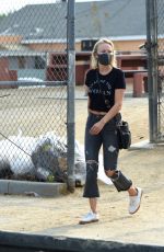 MALIN AKERMAN in Ripped Denim and Year of the Woman T-shirt Out in Los Angeles 09/09/2020