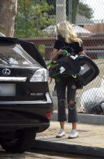 MALIN AKERMAN in Ripped Denim and Year of the Woman T-shirt Out in Los Angeles 09/09/2020