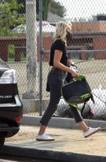 MALIN AKERMAN in Ripped Denim and Year of the Woman T-shirt Out in Los Angeles 09/09/2020