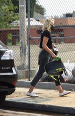 MALIN AKERMAN in Ripped Denim and Year of the Woman T-shirt Out in Los Angeles 09/09/2020