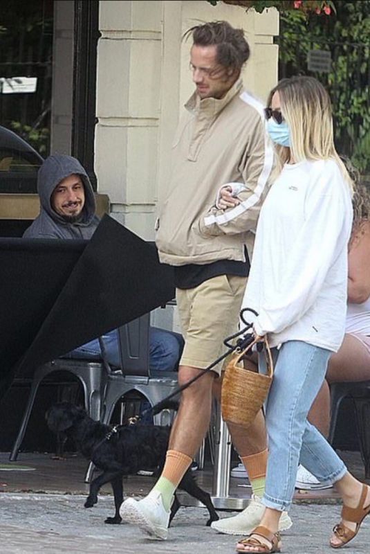 MARGOT ROBBIE and Tom Ackerley Out with Their Dog in London 09/19/2020