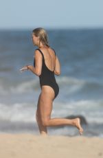 TAYLOR NEISEN in Swimsuit at a Beach i The Hamptons 09/06/2020