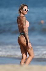 TINA LOUISE in Bikini and Brian Austin Green at a Beach in Los Angeles 08/31/2020