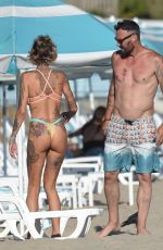 TINA LOUISE in Bikini and Brian Austin Green at a Beach in Los Angeles 08/31/2020