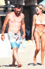 TINA LOUISE in Bikini and Brian Austin Green at a Beach in Los Angeles 08/31/2020