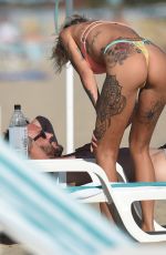 TINA LOUISE in Bikini and Brian Austin Green at a Beach in Los Angeles 08/31/2020