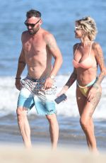 TINA LOUISE in Bikini and Brian Austin Green at a Beach in Los Angeles 08/31/2020