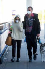 ZOE KRAVITZ and Karl Glusman at JFK Airport in New York 08/31/2020