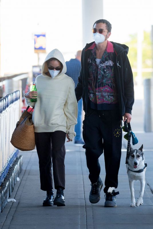 ZOE KRAVITZ and Karl Glusman at JFK Airport in New York 08/31/2020