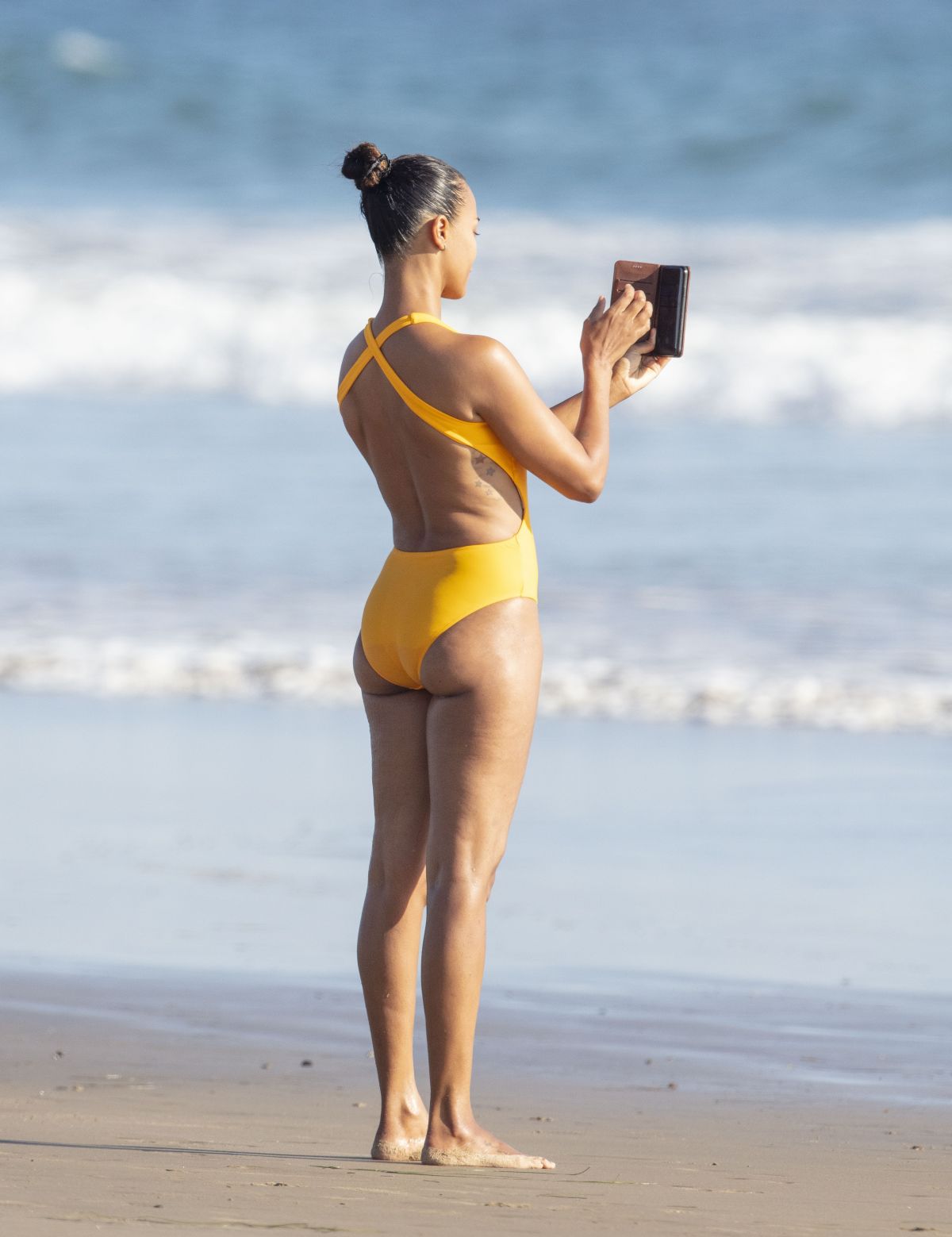 ZOE SALDANA in Swimsuit at a Beach in Malibu 09/06/2020.