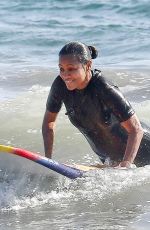 ZOE SALDANA in Wetsuit at Surf Session in Malibu 09/20/2020