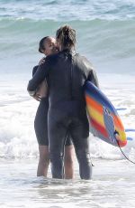 ZOE SALDANA in Wetsuit at Surf Session in Malibu 09/20/2020