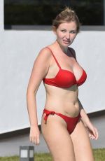 AMY HARD in a Red Bed Bikini at a Pool in Portugal 10/01/2020