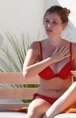 AMY HART in a Red Bed Bikini at a Pool in Portugal 10/02/2020